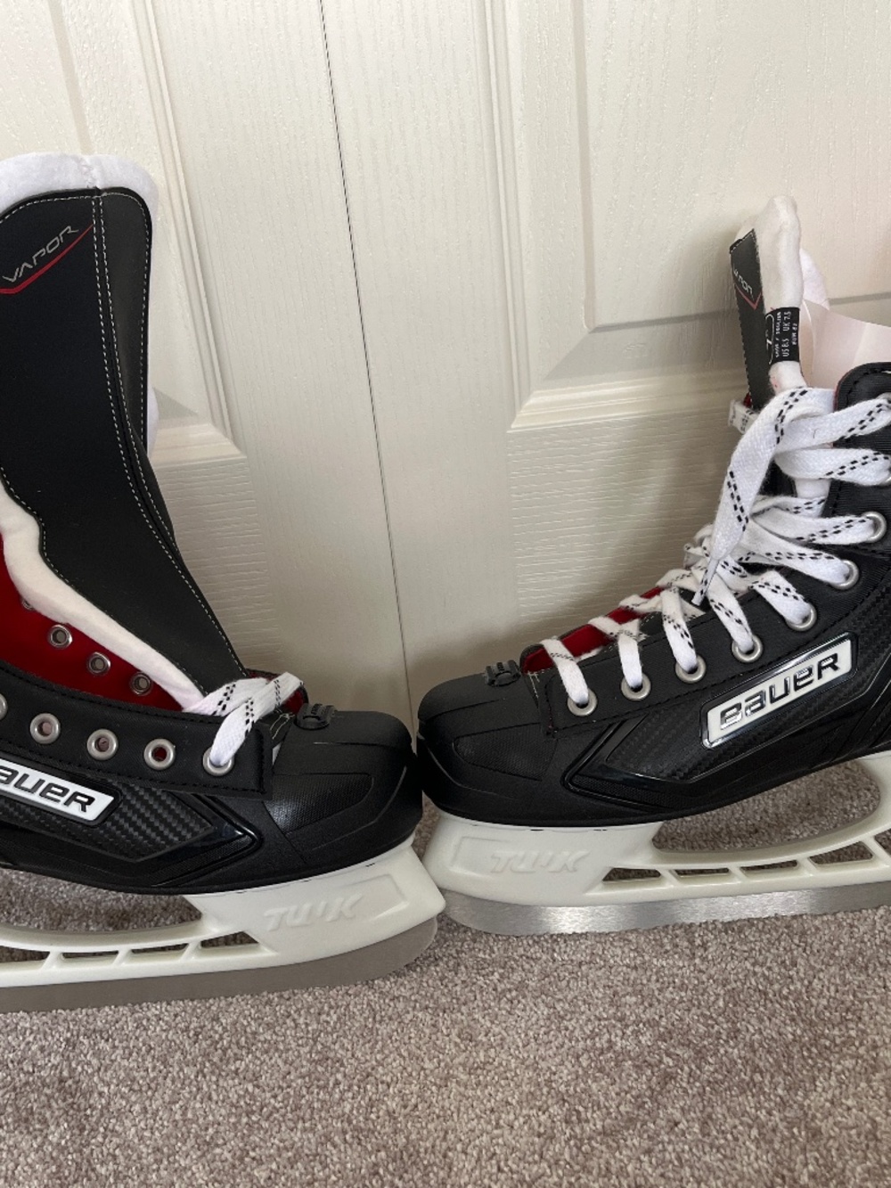 Bauer Vapor X300 skates with blade protectors